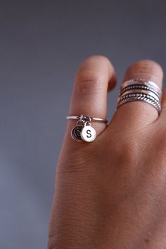 "This lovely cute ring is made from sterling silver. It has TWO initial charms of your choice.It can have two initials or ONE initial and ONE heart charm. This ring is lovely to wear on its own or stack it together with other rings. The charm is solid silver and is about 7mm big and 1.5mm thick. Please leave your wanted size of the ring and the initials you want at the checkout \"Notes to Seller\" Thank you for choosing hand made. :) Edite Best regards Edite" Minimalist Hand Stamped Midi Rings, Sterling Silver Initial Ring For Everyday, Tiny Silver Stackable Rings As Gift, Adjustable Hand Stamped Initial Ring Minimalist, Adjustable Hand Stamped Minimalist Initial Ring, Adjustable Minimalist Hand Stamped Initial Ring, Simple Silver Open Ring, Everyday Sterling Silver Nickel-free Midi Rings, Everyday Nickel-free Sterling Silver Midi Rings