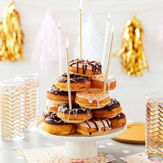 a stack of donuts sitting on top of a table