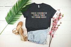 Funny Mom Shirt, Chaos Coordinator Shirt, Mom Life T-Shirt, Daycare Owner Shirt, Babysitter Gift Shirt, Tiny Human Herder Shirt, Mom T-Shirt, Funny Gift For Mom, Mother's Day Shirt,  Funny Mom Shirt, Chaos Coordinator, Daycare Gift Shirt, Babysitter Gift Tee, Child Minder Gift, Tiny Human Herder, Daycare Owner Tee, Mom Life Shirt, Mother's Day Gift, Gift For Teacher, Babysitter Shirt  - Product Details: There are mix of unisex and women's shirts offered.  - Reading the Sizing Chart: The sizing c Daycare Owner, Chaos Coordinator Shirt, Daycare Gifts, Babysitter Gifts, Funny Mom Shirt, Chaos Coordinator, Funny Mom Gifts, Mom Life Shirt, Funny Mom Shirts