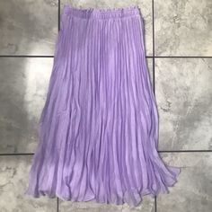 Light Purple Long Lined Pleated Skirt In Airy Fabric With A High Waist, Covered Elastic Waistband With Ruffle Trim Material: 100% Polyester Measurements: " Length Free Shipping For Most Bundles With Multiple Items Low Ball Offers Will Be Declined Elegant Lavender Skirt For Spring, Chic Pleated H&m Bottoms, Chic Pleated H&m Skirt, Chic Pleated Skirt From H&m, Chic Pleated Skirt By H&m, Chic Pleated Bottoms By H&m, Purple Pleated Bottoms For Spring, H&m Pleated Summer Skirt, Spring Purple Pleated Maxi Skirt