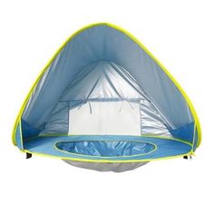 a blue and yellow tent with a white sheet on it's back end, in front of a white background