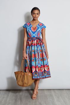 You will love our Tapestry Floral printed cotton midi dress. With its v-neckline, self-belt & pleats that begin at the waist & extend to the hem, this dress is a standout. Engineered Printed Cotton Midi Dress with Self Sash & Full Skirt 100% Cotton Runs true to Size Model is 5'9" and wearing size 4 Dry Clean Only Imported Style #: ETR41339 Cotton Midi Dress Summer, Dream Teacher, Kente Dress, Image Consultant, Floral Print Midi Dress, Floral Tapestry, Cotton Midi Dress, Midi Dress Summer, Tres Chic