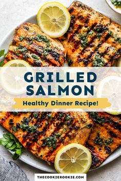 grilled salmon on a white plate with lemons and parsley garnish