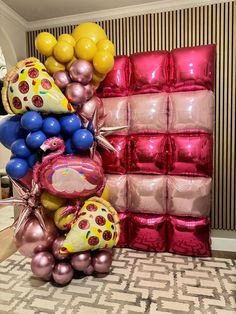 a bunch of balloons that are sitting on the floor