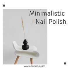 a small black vase sitting on top of a white chair with the words minimalistic nail polish