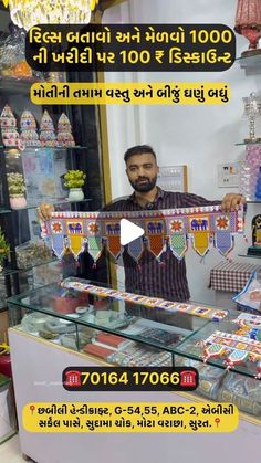 a man is holding up a display case with many items in it and the caption reads