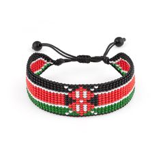 This unique bracelet is made with glass beads and features the flag of Kenya in vibrant colors. The bracelet is adjustable to fit most wrist sizes and is perfect for both men and women. The beads are handmade and each one is unique, making this a one-of-a-kind accessory. The bracelet is also lightweight and comfortable to wear, making it a great addition to any outfit. Whether youre looking for a gift for someone special or just want to show your support for Kenya, this bracelet is a great choice. Kenya Flag, Flag Beads, Loom Bracelets, Unique Bracelets, The Flag, Kenya, Beaded Bracelet, Glass Beads, Jewelry Bracelets