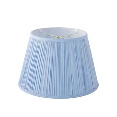 a light blue lamp shade on a white background with gold pinstripe trimming