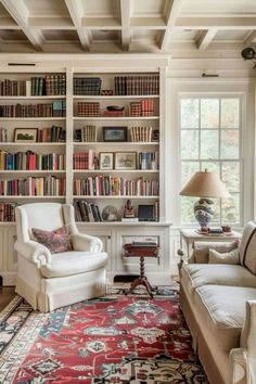 a living room filled with lots of furniture and bookshelves covered in bookcases