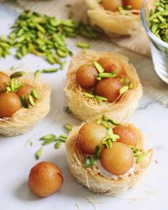 some food that is sitting on top of a table next to other foods and garnishes