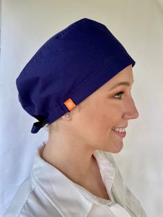 Scrub Hair Caps with adjustable back strap design. Available for all head shapes and hair styles. Ideal for all health care providers: doctors, nurses, dentists, assistants, etc. Made with signature cotton fabric. Soft and comfortable for all day wearing. Care instructions: - Wash with phosphate free detergent. - Warm or cool delicate setting. - Tumble dry or line dry. - Iron on the back of the printed fabric. - Shrinkage may occur during washing. Dental Caps, Hair Caps, Dental Scrubs, Navy Blue Scrubs, Handmade Scrub, Blue Scrubs, Surgical Caps, Scrub Hat, Head Shapes