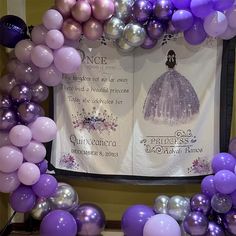 purple and silver balloons are arranged around a princess's dress on a banner that reads once