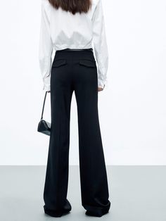 MO&Co. Women's High Waist Tailored Pants Feel confident and stylish with these tailored pants. Crafted from pure wool, with a straight-leg cut and a flattering drape, these pants feature a zip, hook and button closure as well as side pockets. Elevate your look with the perfect blend of sophistication and chic – pair them with a shorter top for a truly unique and fashionable ensemble. Features : - Straight cut with slightly wide hems- Zipper, hook and button closure- Double side pocket design Cod Office Dress Pants With Pockets And Full Length, Office Dress Pants With Pockets Full Length, Full Length Office Dress Pants With Pockets, Office Full-length Dress Pants With Pockets, Office Pantsuit With Belt Loops, Wide Leg Pants With Welt Pockets For Work, Black Wool Wide Leg Office Pants, Full Length Work Pants With Welt Pockets For Office, Business Wide Leg Full Length Pants With Pockets