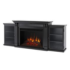 an entertainment center with a fire place and shelves on the sides, in front of a white background