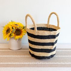 IN STOCK NOW SHIPPING FROM LOS ANGELES Add some summer vibes to your wardrobe with Elena Handbags' Raffia Basket Bag. Perfect for a day at the beach or a summer picnic, this bag features a stylish striped design and is made from durable and lightweight raffia material. Stay on trend and stand out with this must-have summer fashion accessory! Natural Soft Raffia Straw Handmade Size: 9"H x 14"W x 7"D Designer Style ID: 8652 Trendy Natural Colored Bag For Picnic, Trendy Natural Color Bag For Picnic, Trendy Natural Color Picnic Bag, Trendy Bucket Bag For Picnic, Trendy Rectangular Beach Bag For Picnic, Woven Summer Bags For Picnic, Casual Bucket Straw Bag As Gift, Chic Bucket Bag For Picnic, Trendy Rectangular Beach Bag For Picnics