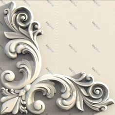 an ornate design on the wall in white