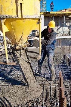 a construction worker is working on the ground