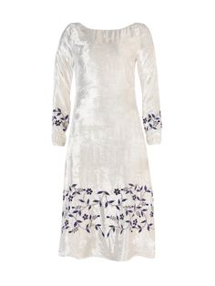 There isn't a more obvious example of luxury, opulence and romance than the Taj Mahal. The marble dress takes inspiration from this icon of Islamic architecture and offers delicate embroidery in three colors on marble white velvet with wood beads that add texture.Hidden pockets inseamBoat neckline with Deep V in the back Shell: 100% viscose velvetLining: 100% viscoseDry clean or hand wash only. Shells Embroidery, White Velvet Dress, Marble Dress, Velvet Wedding Dress, Velvet Wedding, Wedding Dress White, The Taj Mahal, Delicate Embroidery, White Velvet