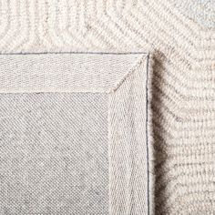 a close up view of the corner of a rug