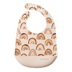 a bib with an orange and white rainbow pattern on the front, it has a wooden