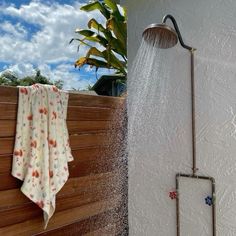 a shower head with water coming out of it