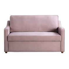 a pink couch sitting on top of a white floor