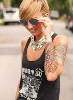 She just knows how to "rock" it! Wearing a rock n' roll t-shirt, "pleather" pencil skirt and flat sandals! What?!?! Does that sound like a "tomboy-girly" look? Not really. But, you add the awesome looking choker  statement necklace, and it screams AHHH-SUM!!! It's the necklace! Coney Island   Leather   Celebrity Charity Fashion Auction Statement Choker Necklace, Coney Island, A Rock, Flat Sandals, Rock N Roll, Choker