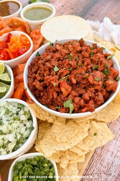 mexican food including tortilla chips, salsa and guacamole