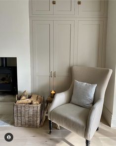 a living room filled with furniture and a fire place