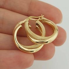 Real 14k Yellow Gold Fancy Frosted Double Hoop Earring 21mm Gift For Mom Christmas Gift * Comes as a pair. * The product is made of 100% 14k Solid Gold and it has a 14K or 585 stamp on item. * The package includes a gold certificate. * Every package comes in a gift box. * Ships from a small business inTurkey 14k gold does not oxidize or discolor, so you can wear your jewelry every day, anywhere! 14k Gold Hoop Earrings As Gift, 14k Stamped Huggie Earrings For Anniversary, 14k Huggie Earrings For Anniversary, Gold Hoop Earrings Stamped 14k For Gift, Gold Hoop Earrings Stamped 14k As Gift, Gold 14k Stamped Hoop Earrings As Gift, 14k Gold Round Hoop Earrings For Gift, Hallmarked Round Huggie Earrings As Gift, Gold 14k Stamped Huggie Earrings