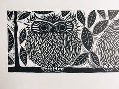 an ink drawing of an owl sitting on a tree branch in front of some leaves