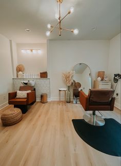 a living room filled with furniture and wooden floors