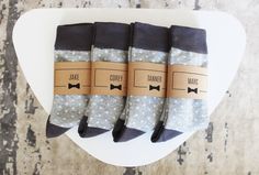 Get the perfect gift for the groomsmen in your wedding - personalized socks! Product details: - Listing is for (1) pair of socks. You can add more to your order by increasing the quantity. - High Quality Men's Dress Socks made from soft & comfortable combed cotton yarn. - Color: Light + Dark Grey with White Polka Dots - Size: Men's 7 - 12 - Material: 75% combed cotton, 23% nylon, and 2% spandex - Designed by Groomsman Gear in Portland, OR - Imported About our Labels: - 65lb Kraft Cardstock P Men's Dress Socks, Groomsmen Socks, Groomsmen Gift Set, Kraft Labels, Polka Dot Socks, Wedding Socks, Personalized Socks, Mens Dress Socks, Polka Dot Wedding