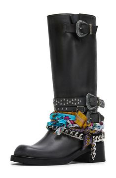 Free-spirited fabric accents combine with sleek hardware on this smooth leather moto boot boasting engraved buckles and gleaming studs. 2" heel 13" shaft; 16" calf circumference Pull-on style Leather and textile upper/synthetic lining and sole Made in Turkey Dress With Moto Boots, Moto Boho Style, Black Moto Boots Outfit, Motor Boots Outfit, Rider Boots Outfit, Depop Ideas, Moto Boots Outfit, Western Punk, Motorcycle Boots Outfit