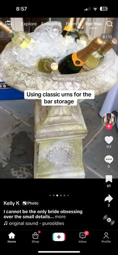 an image of some wine bottles in a fountain on the ground with text reading using classic urns for the bar storage