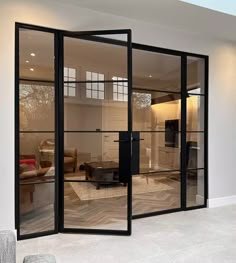 an open living room with sliding glass doors