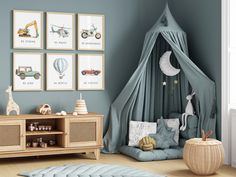 a child's room with blue walls and pictures on the wall