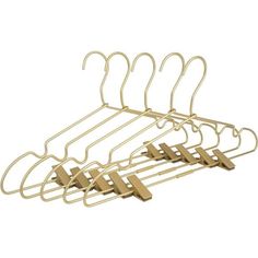 a set of five clothes hangers on a white background