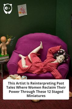 a woman laying on top of a purple chair next to a small table and toy