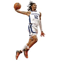 a basketball player in the air with a ball