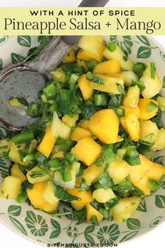 Top view of a bowl of mango pineapple salsa with jalapeno.