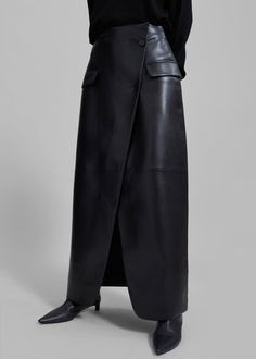 Nan Long Faux Leather Cross Skirt - Black – The Frankie Shop Formal Leather Skirt With Belt Loops, Elegant Asymmetrical Bottoms With Pockets, Chic Asymmetrical Skirt With Pockets, Black Leather Skirt With Pockets, Cross Skirt, Skirt Streetwear, Pu Leather Skirt, Skirt Suits, The Frankie Shop