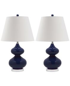 two blue lamps sitting next to each other