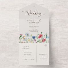 a wedding program with flowers on it