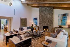 Luxury Beverly Hills ranch home living room interior design with chic & rustic, elegant, modern artistic elements. California Ranch Style Homes, Luxury California, Indoor Outdoor Fireplaces