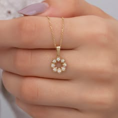 Features Yellow gold and white diamond Material: Solid Gold (not gold plated or gold filled) Available Gold Color: Yellow gold, rose gold and white gold Karat: 14 K (585) Number of Stones: 8 Total CTW: 0.20 Ctw Diamond color: F-G Color Gold grams: 2.10 gr Available with or without chain Made to order As with all of our products, this item is handmade and made to order. All of our items are 14K real gold. We do not use any gold filled, gold plated or gold vermeil items. You can use this elegant c Flower Pendant Designs, Rose Gold Chain Design, White Gold Chain Necklace For Women, Gold Diamond Necklace With Brilliant Cut In Flower Shape, Gold Necklaces With Brilliant Cut In Flower Shape, Gold Flower Shaped Necklace With Brilliant Cut, Gold Brilliant Cut Flower Shape Necklace, 14k Gold Jewelry With Diamond Accents In Flower Shape, Gold Necklace With Diamond Accents And Flower Shape