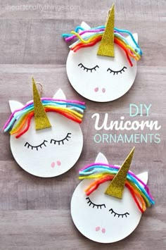 three unicorn crafts made out of paper plates with gold glitter horns and rainbow manes