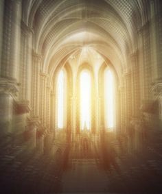 an empty cathedral with sunlight streaming through the windows and light coming in from behind it