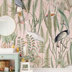 the wallpaper in this bathroom is painted with tropical birds and plants on pink background