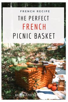 the perfect french picnic basket with oranges and wine